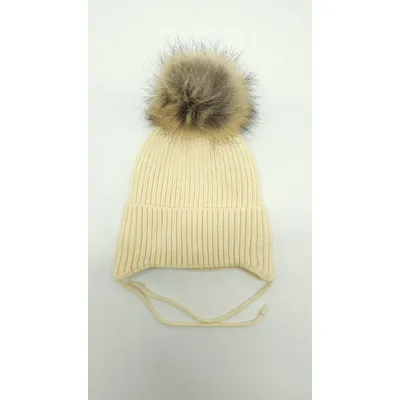 Шапка в’язана в рубчик на зав’язки з натуральним єнотовим помпоном на флісовій підкладці з манжетом Orange Glory Kids 48-50 Ваніль 9119